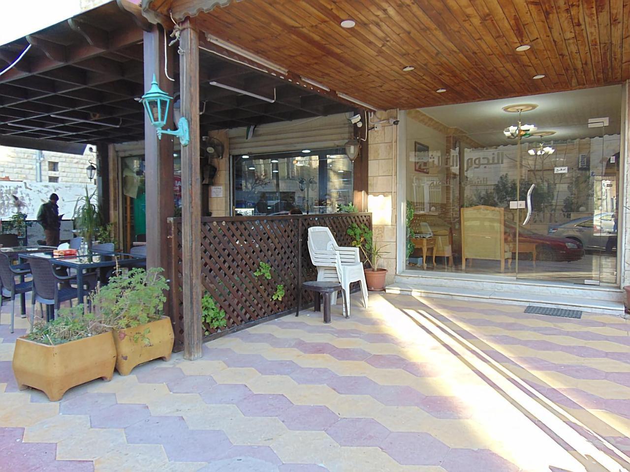 Al-Nujoom Hotel Suites Amman Exterior foto